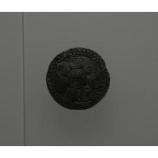 Bronze discs adorned with solar symbols, spiral sun disc